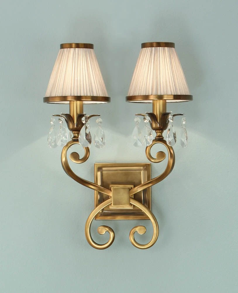 Interiors 1900 UL1PBSH-UL1W2B New Classics Oksana Antique Brass Twin Wall Light & Beige Shades 1 Interiors 1900 UL1PBSH-UL1W2B New Classics Oksana Antique Brass Twin Wall Light & Beige Shades